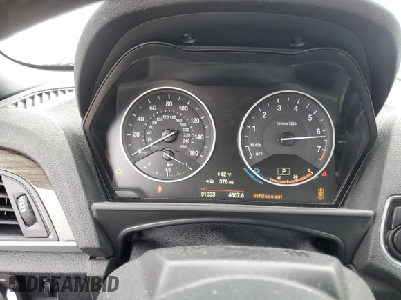 2015 BMW 2 Series 228i with VIN WBA1K5C57FV474037, listed as a Copart auction lot 87857635 with 91,333 mi miles and Salvage title. Bid and sale history available at DreamBid. Image 9.