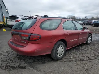 1998 Mercury Sable LS z VIN 1MEFM55U2WA603086, wystawiony jako Copart lot #88533205 z przebiegiem 151 086 mil mil oraz Szkoda całkowita • Salvage title. Historia ofert i sprzedaży dostępna na DreamBid. Obrazek 3.