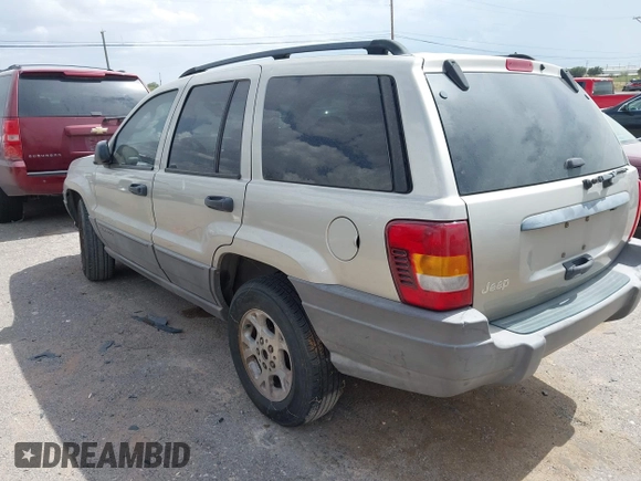 2003 Jeep Grand Cherokee Laredo with VIN 1J4GX48S73C515727, listed as a IAAI auction lot 42555080 with 275,035 mi miles and . Bid and sale history available at DreamBid. Image 3.