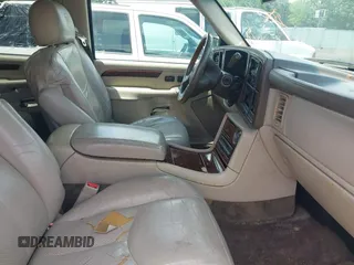 2003 Cadillac Escalade z VIN 1GYEC63T73R187253, wystawiony jako IAAI lot #42299186 z przebiegiem 288 373 mil mil oraz . Historia ofert i sprzedaży dostępna na DreamBid. Obrazek 5.