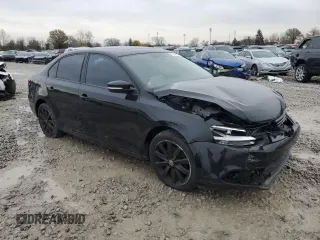2012 Volkswagen Jetta SE with VIN 3VWDX7AJ9CM417564, listed as a Copart auction lot 77314634 with 235,196 mi miles and Salvage title. Bid and sale history available at DreamBid. Image 4.
