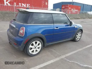 2007 MINI Hardtop S with VIN WMWMF73517TL88586, listed as a IAAI auction lot 41866845 with 181,706 mi miles and . Bid and sale history available at DreamBid. Image 4.