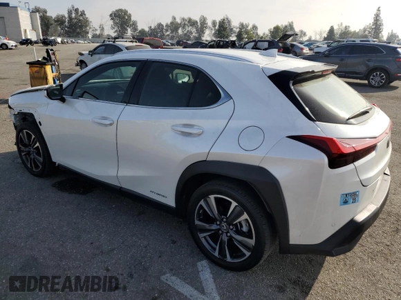 2022 Lexus UX 250h with VIN JTHX9JBH2N2056285, listed as a Copart auction lot 87221214 with 33,377 mi miles and Salvage title. Bid and sale history available at DreamBid. Image 2.