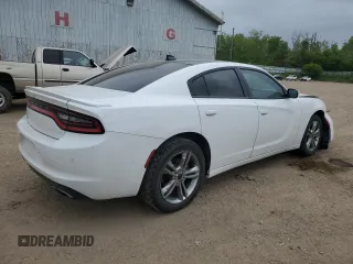 2015 Dodge Charger SXT with VIN 2C3CDXJG7FH779296, listed as a Copart auction lot 58490215 with 173,371 mi miles and Clean title. Bid and sale history available at DreamBid. Image 3.