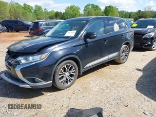 2016 Mitsubishi Outlander SE with VIN JA4AD3A34GZ004085, listed as a IAAI auction lot 41973344 with 122,849 mi miles and . Bid and sale history available at DreamBid. Image 2.