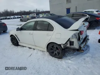 2010 Mitsubishi Lancer Evolution GSR with VIN JA32W8FV4AU604717, listed as a Copart auction lot 83896464 with 140,502 mi miles and Salvage Title. Bid and sale history available at DreamBid. Image 2.