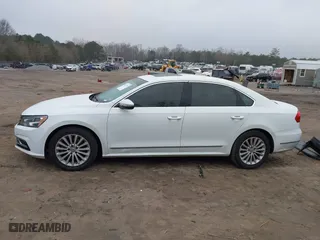 2016 Volkswagen Passat 1.8T SE w/Technology with VIN 1VWBS7A30GC013454, listed as a IAAI auction lot 41477109 with 134,027 mi miles. Bid and sale history available at carsss.com. Image 15.