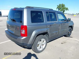 2014 Jeep Patriot Sport with VIN 1C4NJRBB5ED574390, listed as a IAAI auction lot 41949395 with 61,911 mi miles. Bid and sale history available at carsss.com. Image 4.
