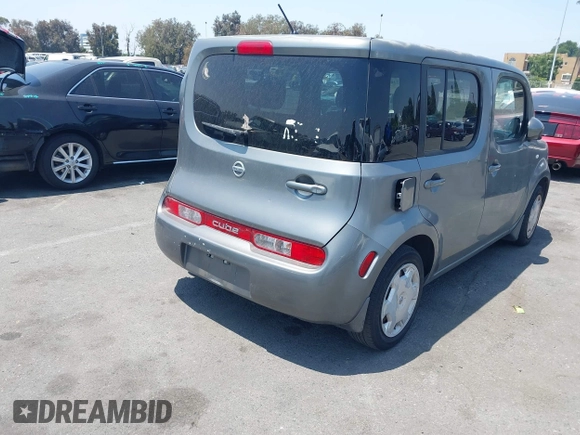 2011 Nissan Cube S z VIN JN8AZ2KR0BT213764, wystawiony jako IAAI lot #42471649 z przebiegiem 180 669 mil mil oraz . Historia ofert i sprzedaży dostępna na DreamBid. Obrazek 4.
