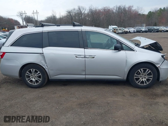 2013 Honda Odyssey EX-L with VIN 5FNRL5H65DB050789, listed as a IAAI auction lot 41911537 with 160,348 mi miles and . Bid and sale history available at carsss.com. Image 13.