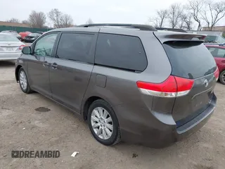 2012 Toyota Sienna LE with VIN 5TDJK3DCXCS047056, listed as a IAAI auction lot 41780756 with 179,624 mi miles. Bid and sale history available at carsss.com. Image 3.