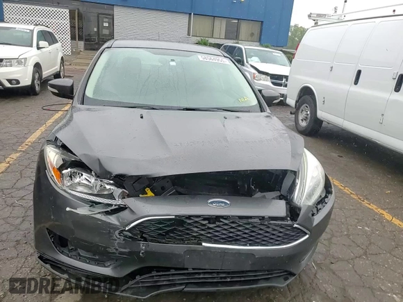 2016 Ford Focus SE with VIN 1FADP3F24GL312246, listed as a Copart auction lot 58564955 with 146,598 mi miles and Clean title. Bid and sale history available at DreamBid. Image 13.