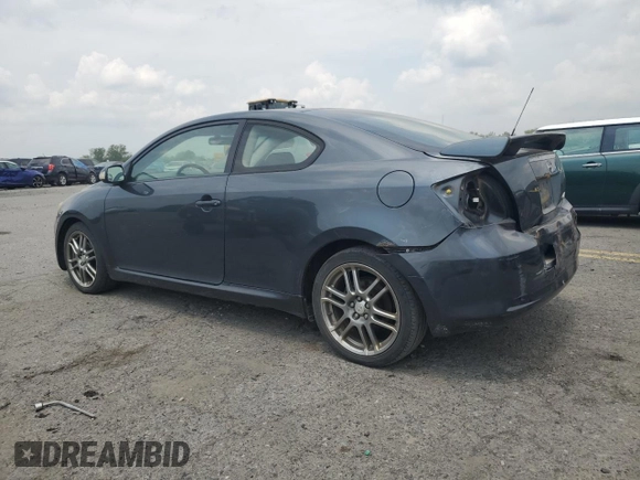 2006 Scion tC z VIN JTKDE177X60123771, wystawiony jako Copart lot #59763245 z przebiegiem 231 959 mil mil oraz Szkoda całkowita • Salvage title. Historia ofert i sprzedaży dostępna na DreamBid. Obrazek 2.