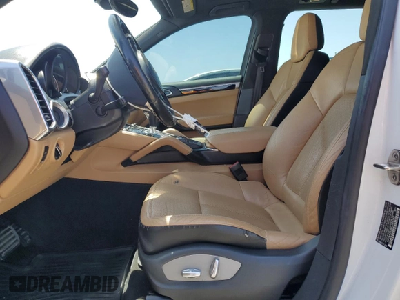 2014 Porsche Cayenne with VIN WP1AA2A28ELA09742, listed as a Copart auction lot 61779285 with 182,380 mi miles and Salvage title. Bid and sale history available at DreamBid. Image 7.