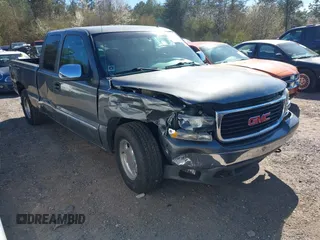 2002 GMC Sierra 1500 SLE z VIN 2GTEC19T721324585, wystawiony jako IAAI lot #41738750 z przebiegiem 103 048 mil mil oraz . Historia ofert i sprzedaży dostępna na DreamBid. Obrazek 1.