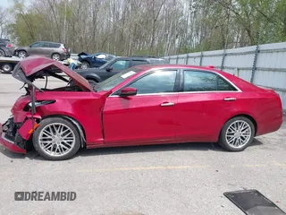 2015 Cadillac CTS Luxury AWD z VIN 1G6AX5SX5F0129130, wystawiony jako IAAI lot #42147471 z przebiegiem 93 678 mil mil oraz . Historia ofert i sprzedaży dostępna na DreamBid. Obrazek 14.