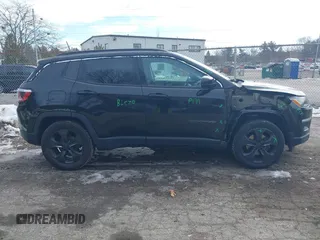 2018 Jeep Compass Altitude with VIN 3C4NJDBB1JT132052, listed as a IAAI auction lot 41622700 with 99,534 mi miles and . Bid and sale history available at carsss.com. Image 13.
