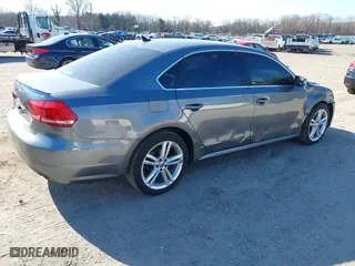 2013 Volkswagen Passat SE w/Sunroof with VIN 1VWBM7A30DC125919, listed as a IAAI auction lot 41759051 with 112,952 mi miles. Bid and sale history available at carsss.com. Image 4.