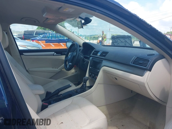 2015 Volkswagen Passat S with VIN 1VWAS7A31FC077982, listed as a IAAI auction lot 42549657 with 64,543 mi miles and . Bid and sale history available at DreamBid. Image 5.