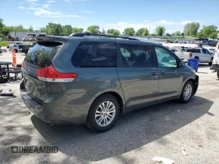 2014 Toyota Sienna XLE with VIN 5TDYK3DC1ES453924, listed as a Copart auction lot 56148565 with 198,185 mi miles and Clean title. Bid and sale history available at DreamBid. Image 3.