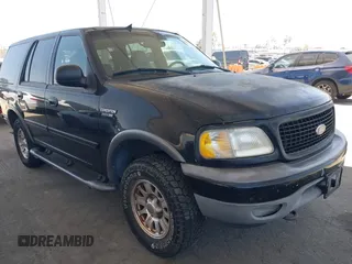 2000 Ford Expedition XLT z VIN 1FMPU16L1YLB57892, wystawiony jako IAAI lot #42311891 z przebiegiem Nie podano mil oraz . Historia ofert i sprzedaży dostępna na DreamBid. Obrazek 1.
