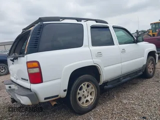 2003 Chevrolet Tahoe LS with VIN 1GNEK13Z63R135474, listed as a IAAI auction lot 42127546 with 318,623 mi miles and . Bid and sale history available at DreamBid. Image 4.