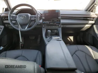 2022 Toyota Avalon XLE z VIN 4T1JZ1FBXNU071758, wystawiony jako Copart lot #42793923 z przebiegiem 32 090 mil mil oraz . Historia ofert i sprzedaży dostępna na DreamBid. Obrazek 8.