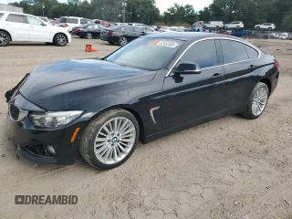 2015 BMW 4 Series 428i xDrive with VIN WBA4A7C54FD413570, listed as a Copart auction lot 62432505 with 98,017 mi miles and Salvage title. Bid and sale history available at DreamBid. Image 1.