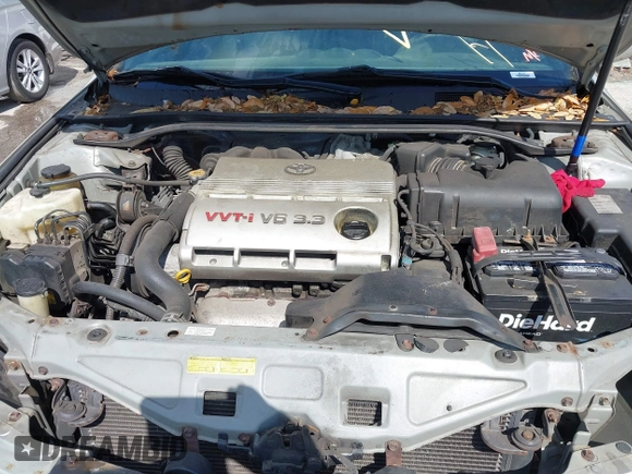 2004 Toyota Solara SE with VIN 4T1FA38P34U031182, listed as a IAAI auction lot 41933785 with 158,624 mi miles. Bid and sale history available at carsss.com. Image 10.
