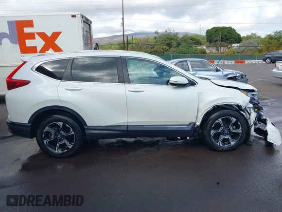 2018 Honda CR-V Touring with VIN 2HKRW1H96JH506435, listed as a IAAI auction lot 41228873 with 11,585 mi miles and . Bid and sale history available at DreamBid. Image 14.