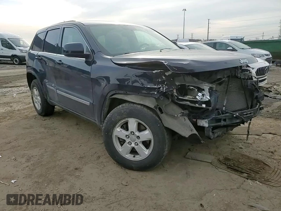 2013 Jeep Grand Cherokee Laredo with VIN 1C4RJEAG1DC584166, listed as a Copart auction lot 52785975 with 210,961 mi miles and Clean Title. Bid and sale history available at carsss.com. Image 11.