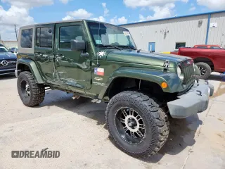 2008 Jeep Wrangler Unlimited Sahara with VIN 1J4GA59148L608970, listed as a Copart auction lot 64433495 with 134,055 mi miles and Salvage title. Bid and sale history available at DreamBid. Image 4.
