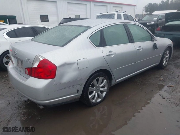2006 Infiniti M35 with VIN JNKAY01E36M109480, listed as a IAAI auction lot 41564281 with 104899 miles. Bid and sale history available at carsss.com. Image 4.