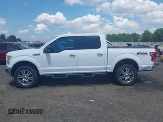 2015 Ford F-150 XLT with VIN 1FTEW1EFXFKD32631, listed as a IAAI auction lot 42454554 with 162,104 mi miles and . Bid and sale history available at DreamBid. Image 14.