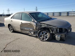 2004 Toyota Camry LE with VIN 4T1BF32K04U574101, listed as a Copart auction lot 47653965 with 0 mi miles and Salvage Title. Bid and sale history available at carsss.com. Image 4.