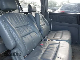 2004 Honda Odyssey EX-L with VIN 5FNRL18924B064040, listed as a IAAI auction lot 41350306 with 130,803 mi miles and . Bid and sale history available at DreamBid. Image 8.