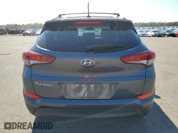 2017 Hyundai Tucson SE z VIN KM8J33A44HU376246, wystawiony jako Copart lot #52453345 z przebiegiem 97 306 mil mil oraz Szkoda całkowita • Salvage title. Historia ofert i sprzedaży dostępna na DreamBid. Obrazek 6.