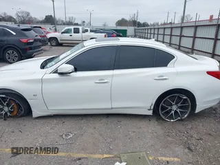 2014 Infiniti Q50 Sport with VIN JN1BV7AP1EM688494, listed as a IAAI auction lot 41622119 with 152,881 mi miles and . Bid and sale history available at DreamBid. Image 14.
