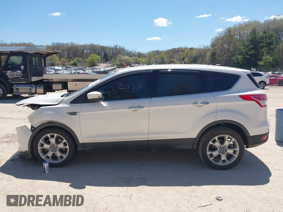 2013 Ford Escape SEL с VIN 1FMCU9H96DUD88466, выставлен на аукционе IAAI как лот 42202030 с пробегом 135 424 миль миль и . История ставок и продаж доступна на DreamBid. Изображение 14.