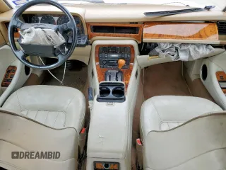 1994 Jaguar XJ with VIN SAJKX1743RC698636, listed as a Copart auction lot 56376685 with 192,928 mi miles and Salvage title. Bid and sale history available at DreamBid. Image 8.