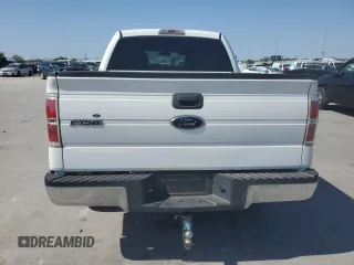 2010 Ford F-150 XL with VIN 1FTEW1C86AFD09059, listed as a Copart auction lot 52771675 with 292,096 mi miles and Salvage Title. Bid and sale history available at carsss.com. Image 6.