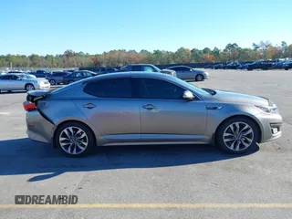 2015 Kia Optima SX Turbo with VIN 5XXGR4A66FG382167, listed as a IAAI auction lot 40951399 with 77,083 mi miles and . Bid and sale history available at DreamBid. Image 13.
