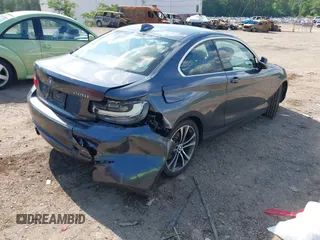 2014 BMW 2 Series 228i with VIN WBA1F5C59EV246205, listed as a IAAI auction lot 42219390 with 142,532 mi miles and . Bid and sale history available at DreamBid. Image 4.