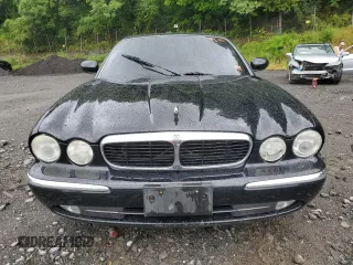 2004 Jaguar XJ with VIN SAJWA71C24SG33915, listed as a Copart auction lot 69626864 with 123,746 mi miles and Non Repairable. Bid and sale history available at carsss.com. Image 5.