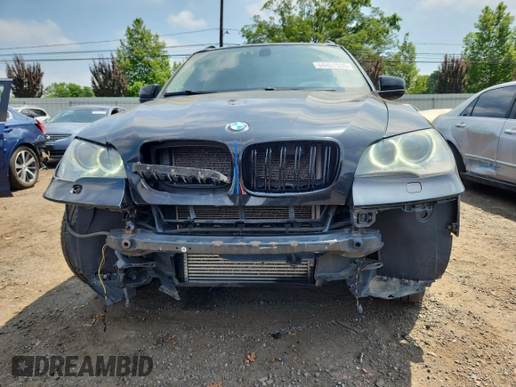2012 BMW X5 35i with VIN 5UXZV4C5XCL765757, listed as a Copart auction lot 64497535 with 178,836 mi miles and Salvage title. Bid and sale history available at DreamBid. Image 5.