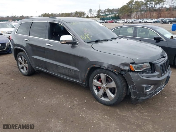2014 Jeep Grand Cherokee Overland with VIN 1C4RJFCGXEC172008, listed as a IAAI auction lot 41719313 with 164,682 mi miles. Bid and sale history available at carsss.com. Image 1.