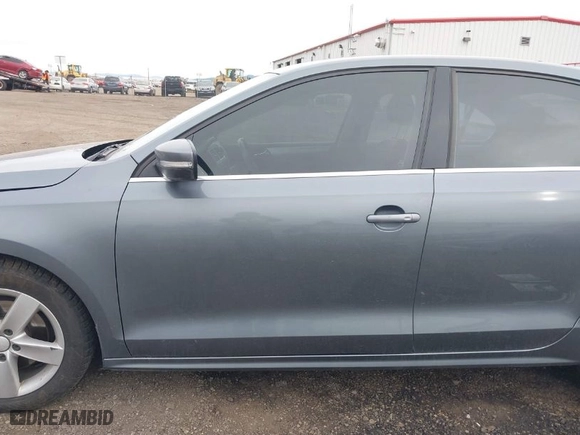 2011 Volkswagen Jetta Sedan TDI with VIN 3VWLL7AJ6BM124923, listed as a IAAI auction lot 41760986 with 204,300 mi miles. Bid and sale history available at carsss.com. Image 14.