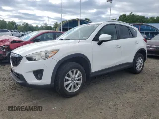 2014 Mazda CX-5 Touring z VIN JM3KE4CY4E0374161, wystawiony jako Copart lot #57355085 z przebiegiem 109 499 mil mil oraz Szkody całkowita. Historia ofert i sprzedaży dostępna na DreamBid. Obrazek 1.