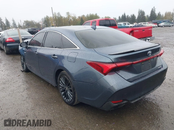 2021 Toyota Avalon Hybrid XSE z VIN 4T1EA1AB9MU007905, wystawiony jako IAAI lot #40501204 z przebiegiem 86 869 mil mil oraz . Historia ofert i sprzedaży dostępna na DreamBid. Obrazek 3.