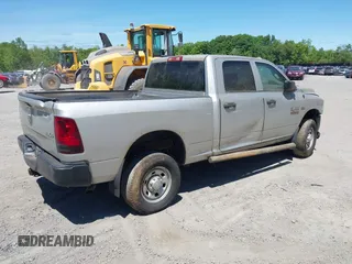 2014 Ram 2500 Tradesman z VIN 3C6TR5CT7EG186099, wystawiony jako IAAI lot #42317585 z przebiegiem 309 687 mil mil oraz . Historia ofert i sprzedaży dostępna na DreamBid. Obrazek 4.